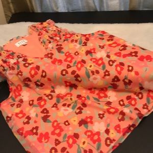 Sleeveless ruffled blouse